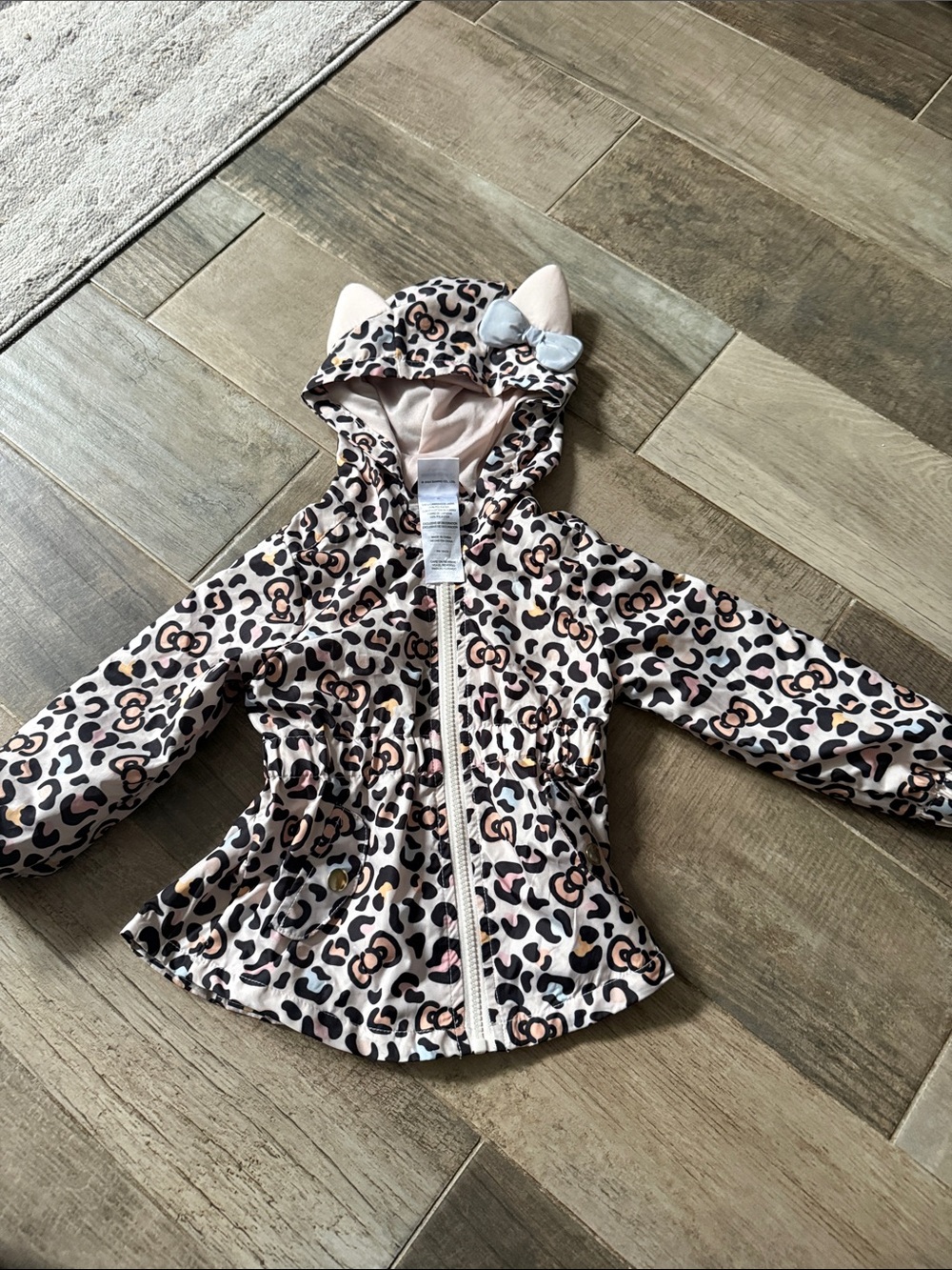 Hello Kitty Girls Leopard Print Hooded Rain Jacket in Pink and Black